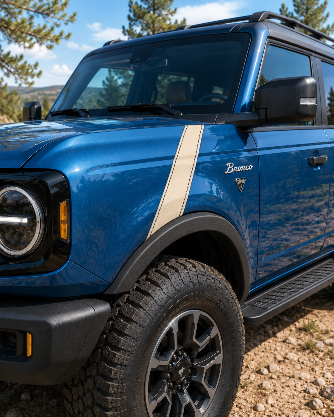 Concept with a cream stitched leather fender accent on a blue off-road vehicle