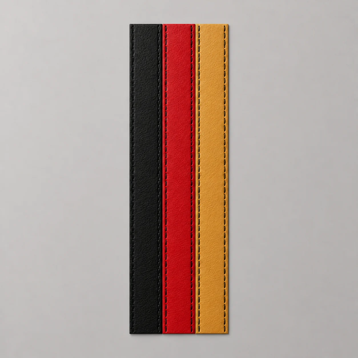 Concept render of black, red and Western Gold leather stripes side by side, each with black stitching, on a neutral background