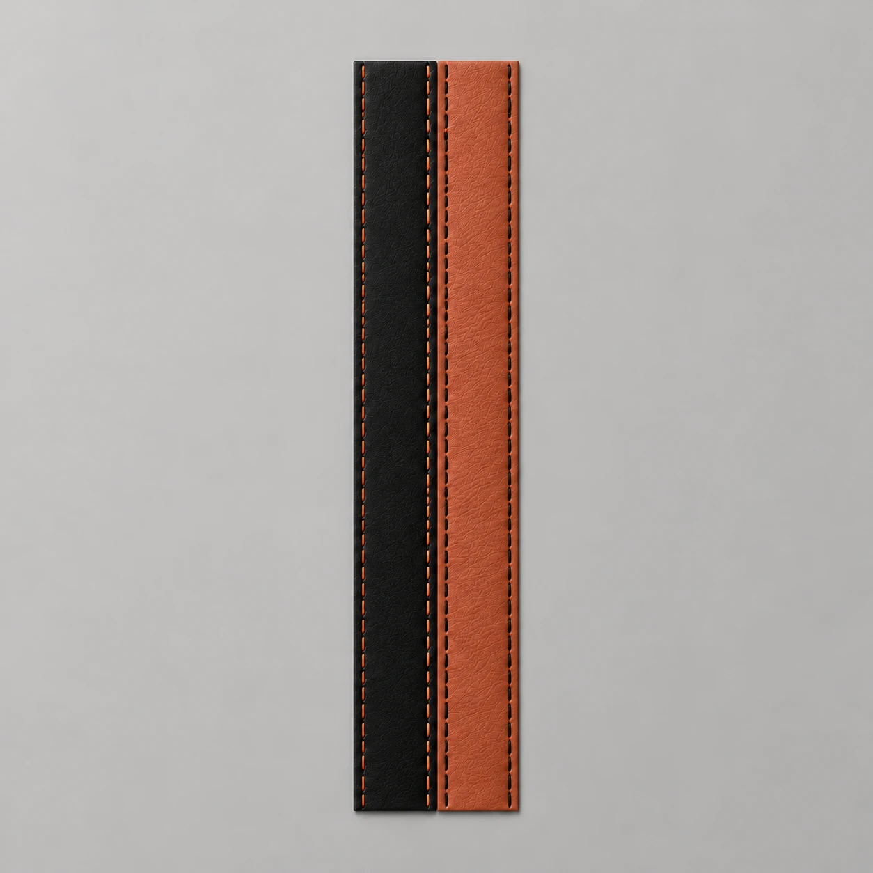 Concept render of a black leather stripe with orange stitching beside a burnt orange stripe with black stitching on a neutral background